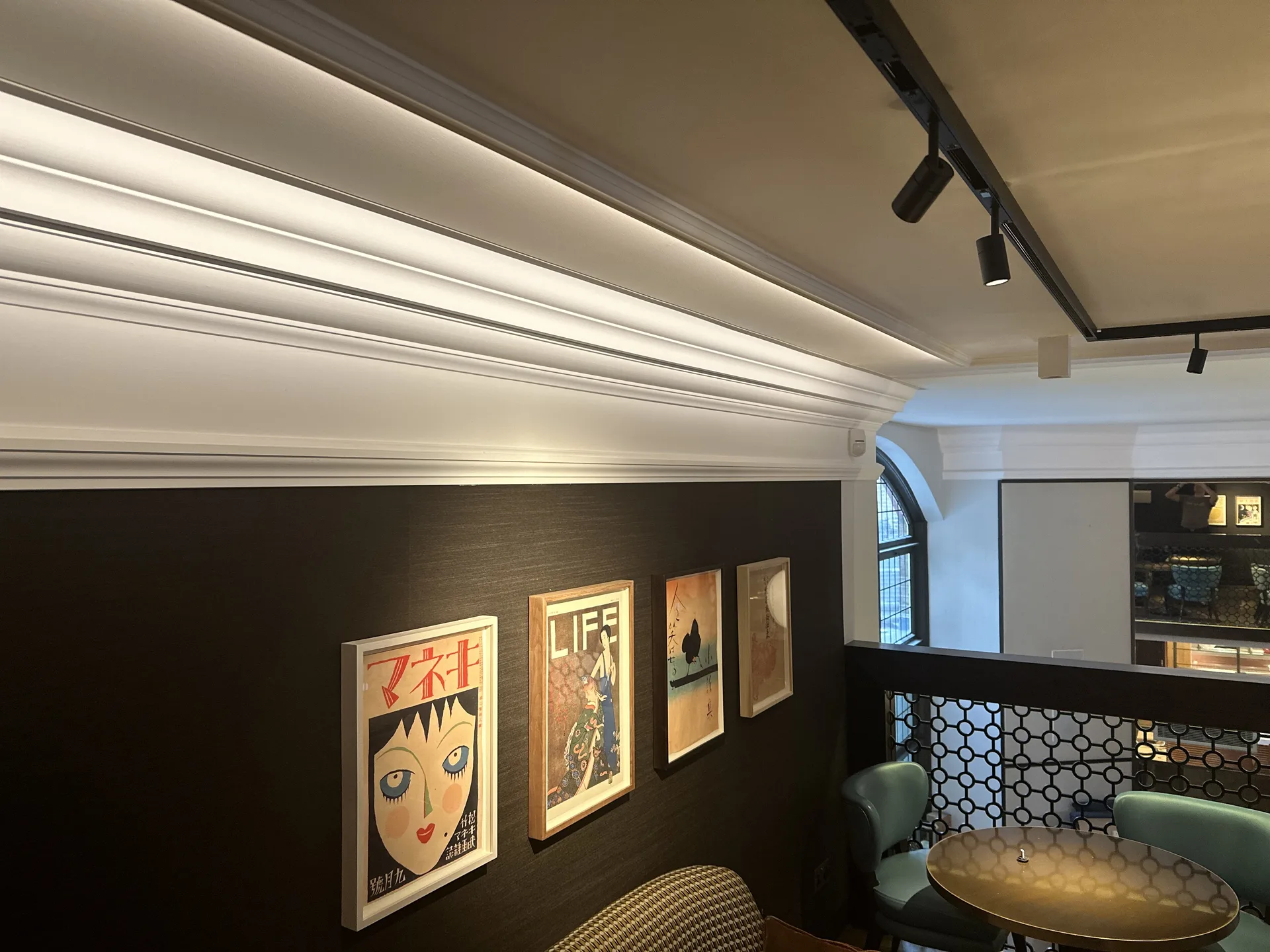 High-end commercial AV installation with integrated screens and audio in a sophisticated meeting space